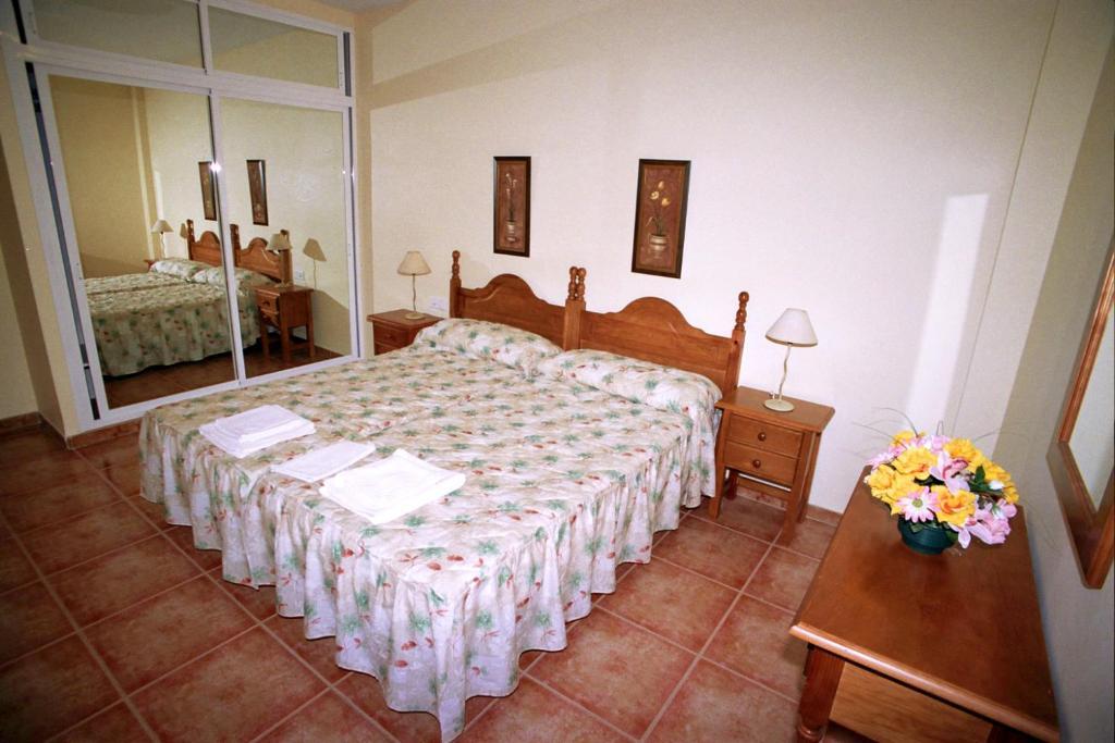Apartamentos La Casa Del Barrio Maro Pokoj fotografie
