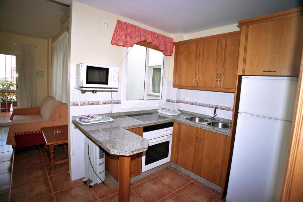 Apartamentos La Casa Del Barrio Maro Pokoj fotografie